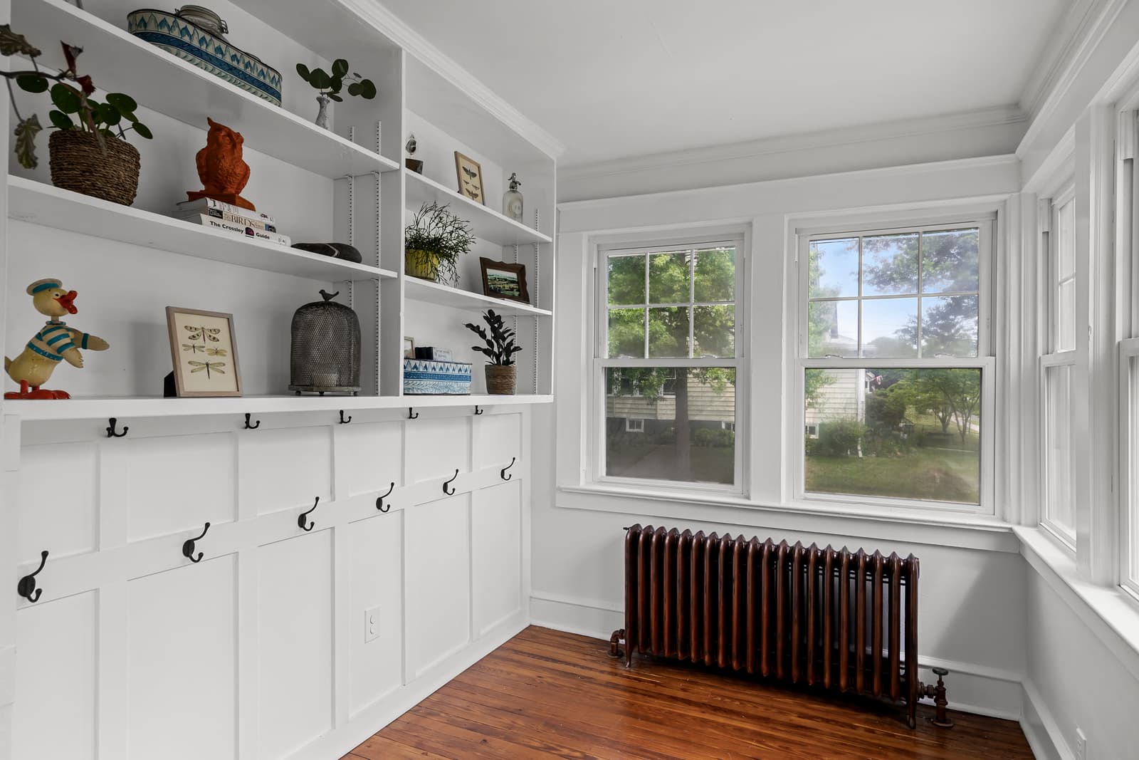 Sunlit sitting room with built-in shelving in a Haddon Township, NJ home