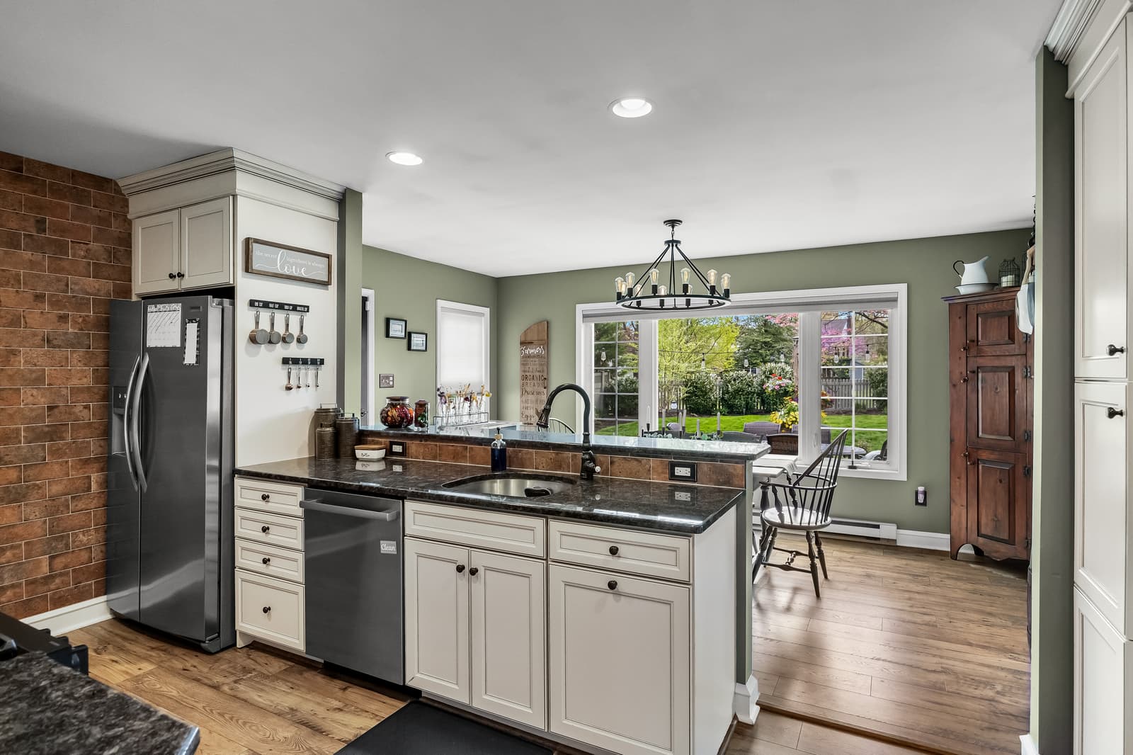 Updated kitchen with stainless appliances and an island in Haddon Township, NJ